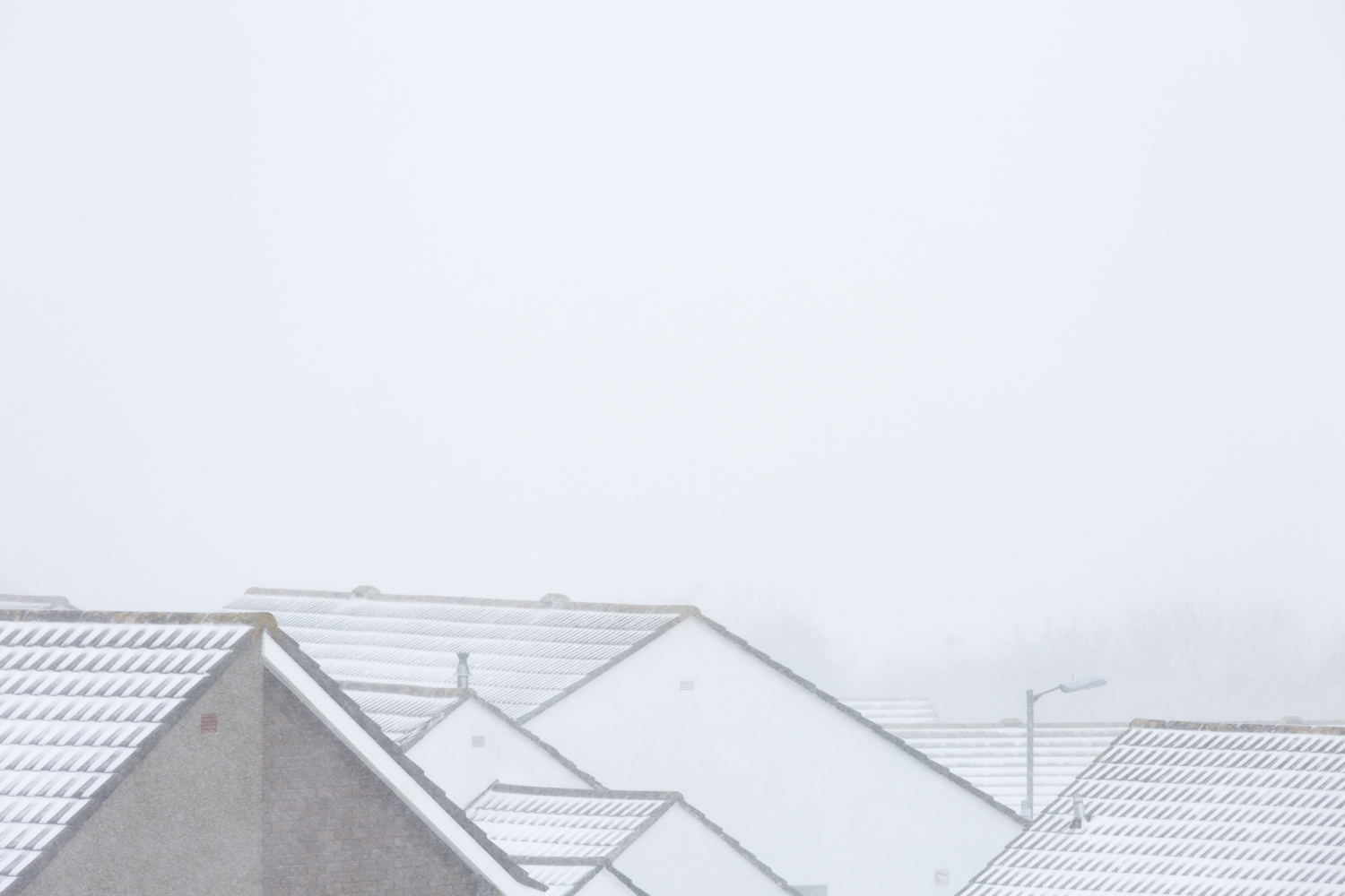 When the beast from the east hit I was at home with both kids.  This shot was taken out of my bedroom window.  Normally this view would extend for miles with a distant St. Ives, but the fierce nature of the snow heavily reduced visibility.  I liked the shapes of houses and repeating pattern.